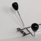 Chrome wall-mounted coat rack