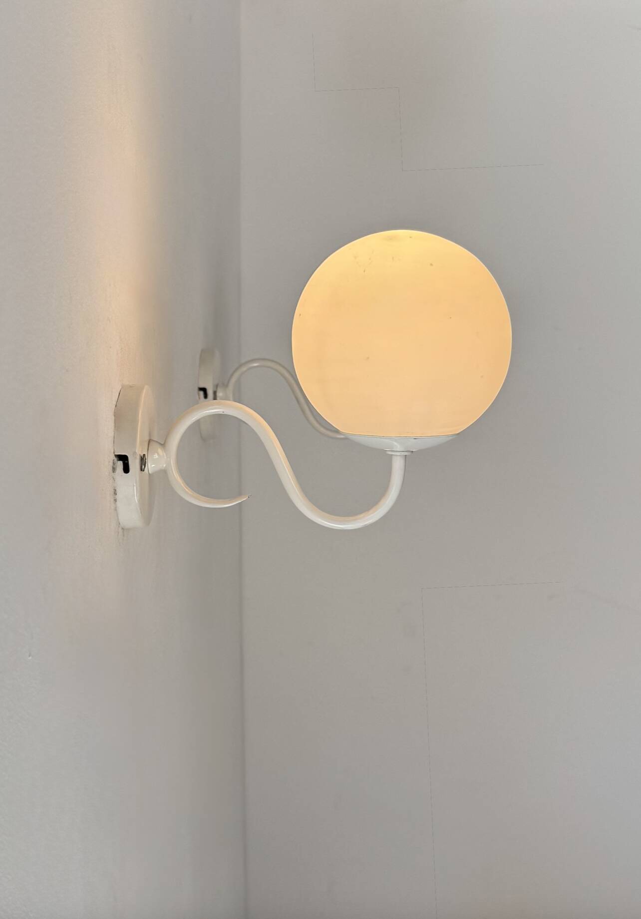 Pair of vintage metal and opaline wall lights, France, 1980.
