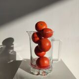 Vintage Italian orangeade pitcher made of red striped glass