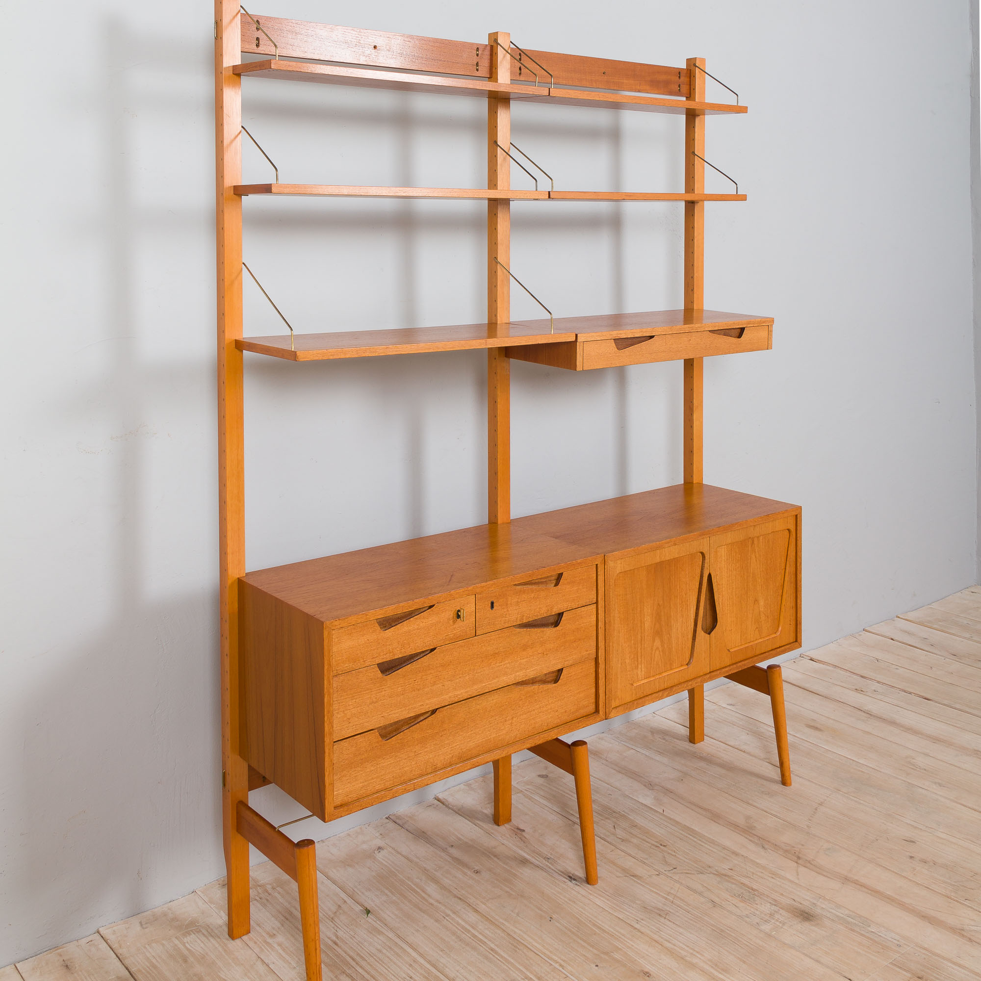 Rival 2 bay teak wall unit with 3 cabinets and 5 shelves by Brodrene Jatogs Norway, Kjell Riise, 196