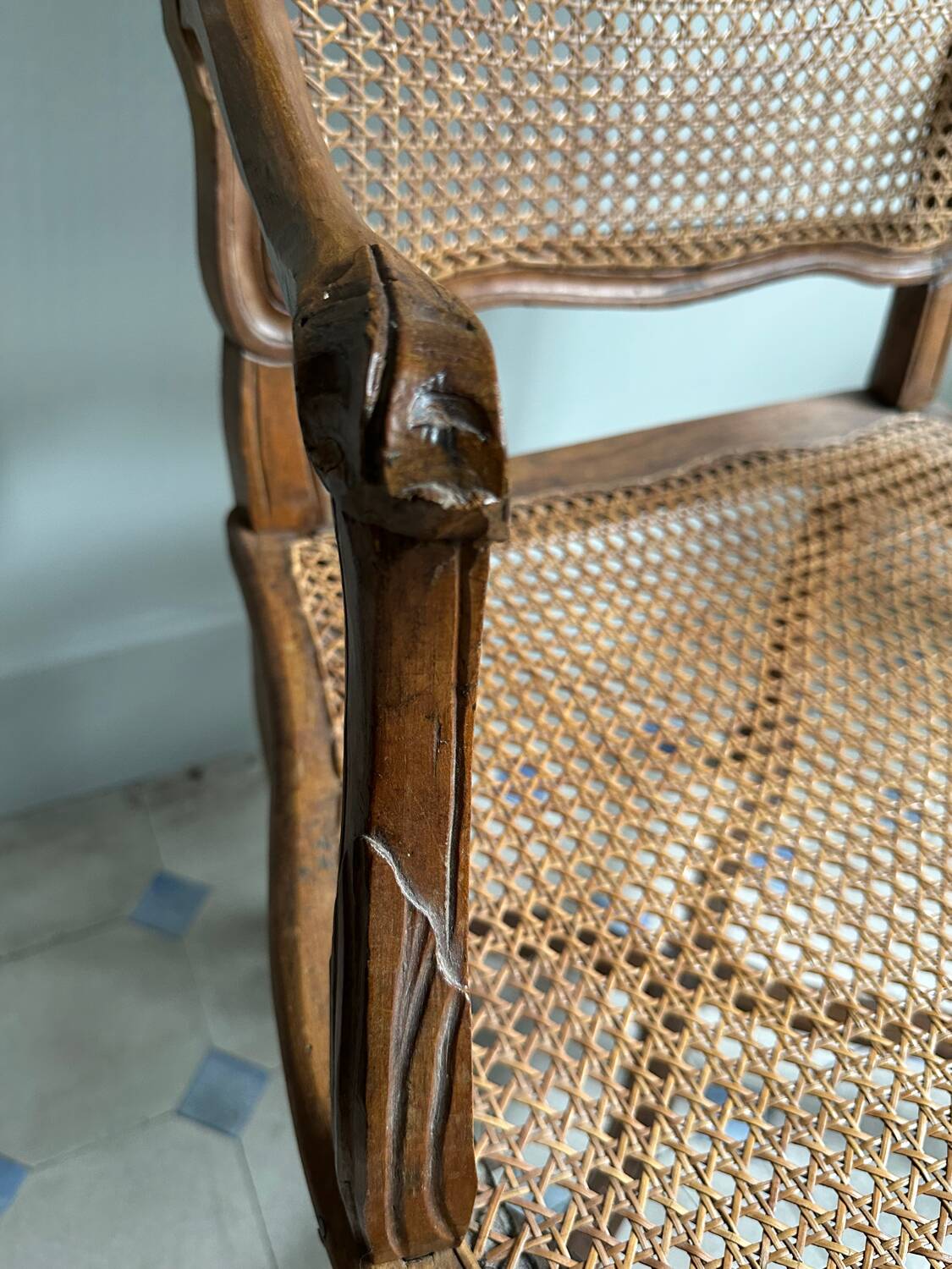 Regency armchair with stretcher