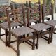 6 solid wood dining chairs with grey woven wool seats.