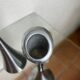 Pair of designer candle holders in stainless steel