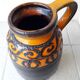 Vase en céramique orange et marron