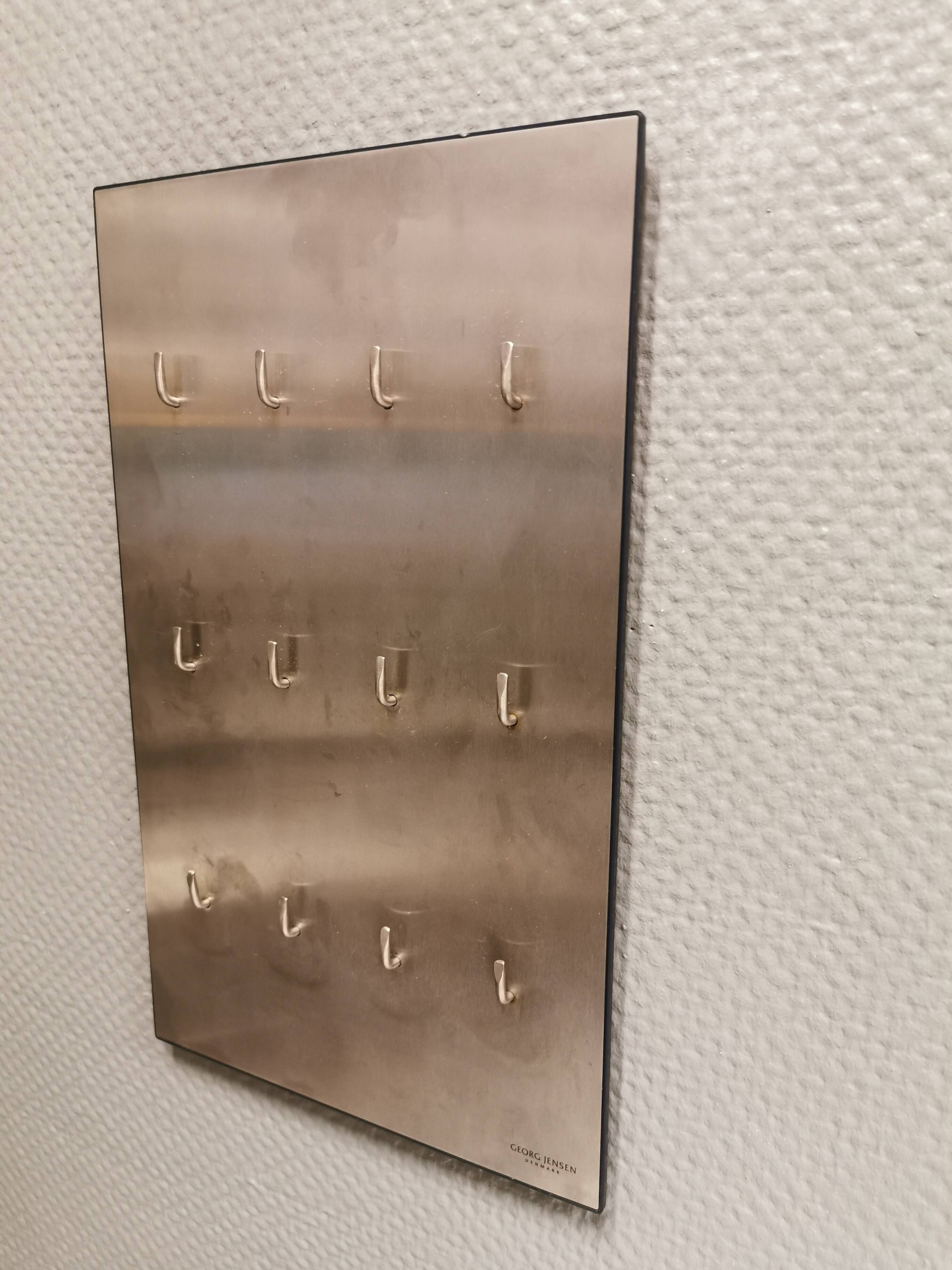 George Jensen key hanging board in brushed steel in classic Danish design.