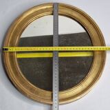 Antique round mirror in gilded wood, original patinated glass from the 19th century, 34 x 37 cm.