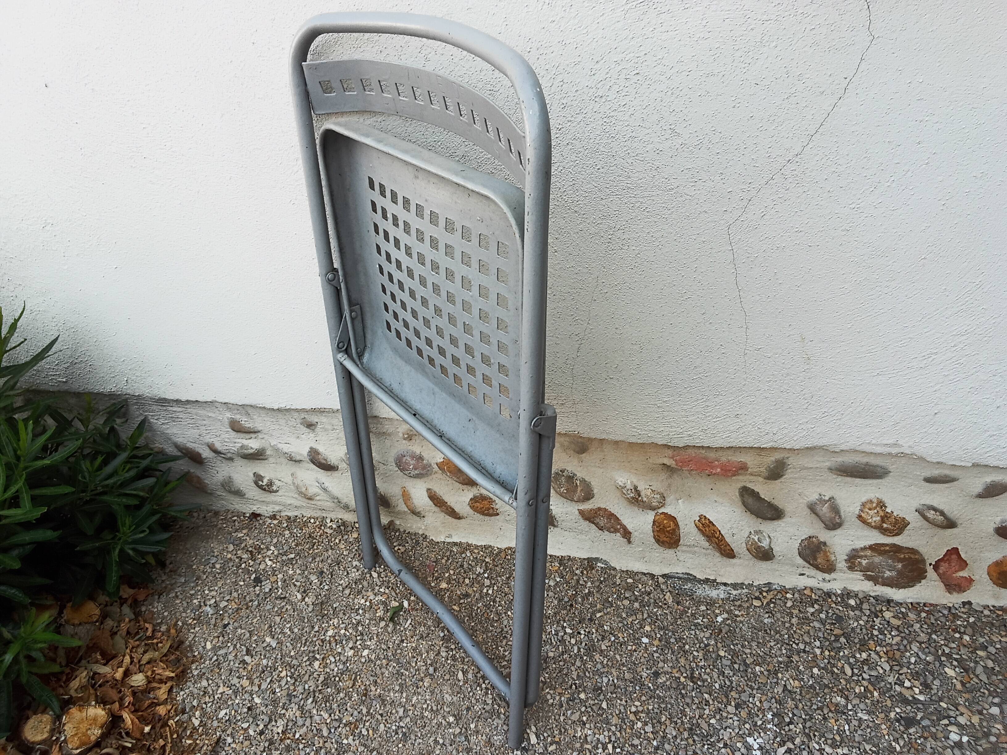 Set of five folding chairs