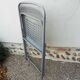 Set of five folding chairs