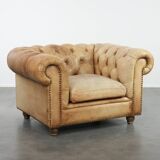 Chesterfield armchair made of cowhide leather in a light cognac colour
