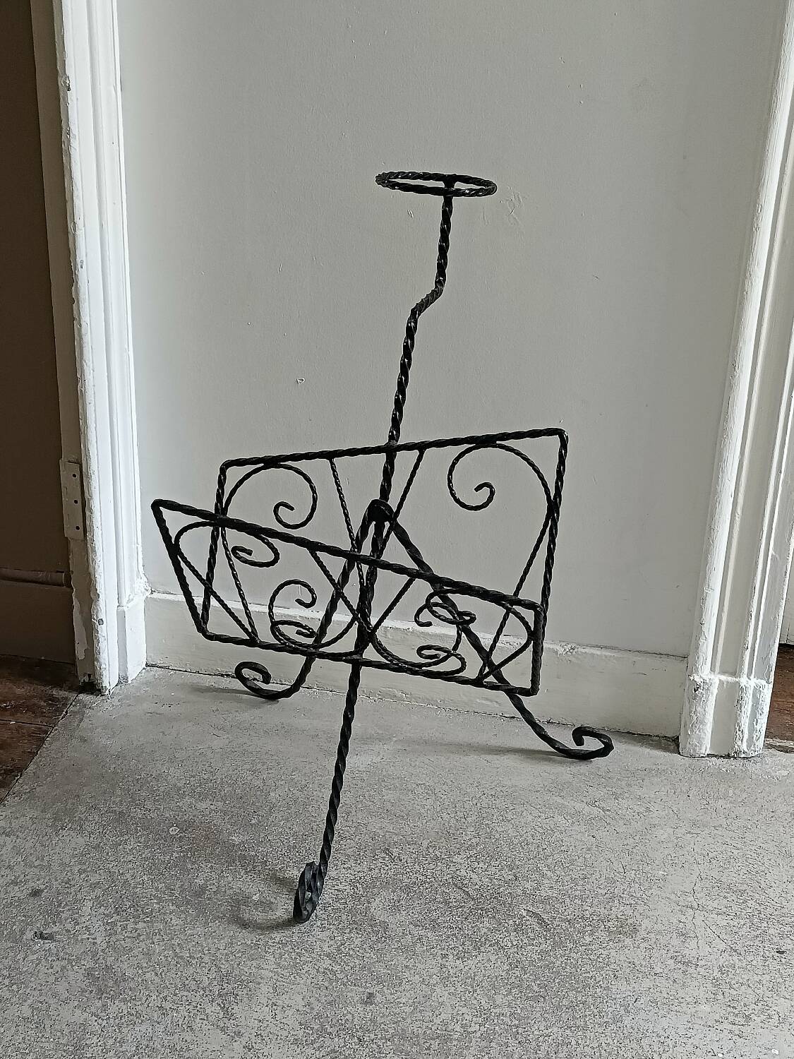 Vintage wrought iron magazine rack