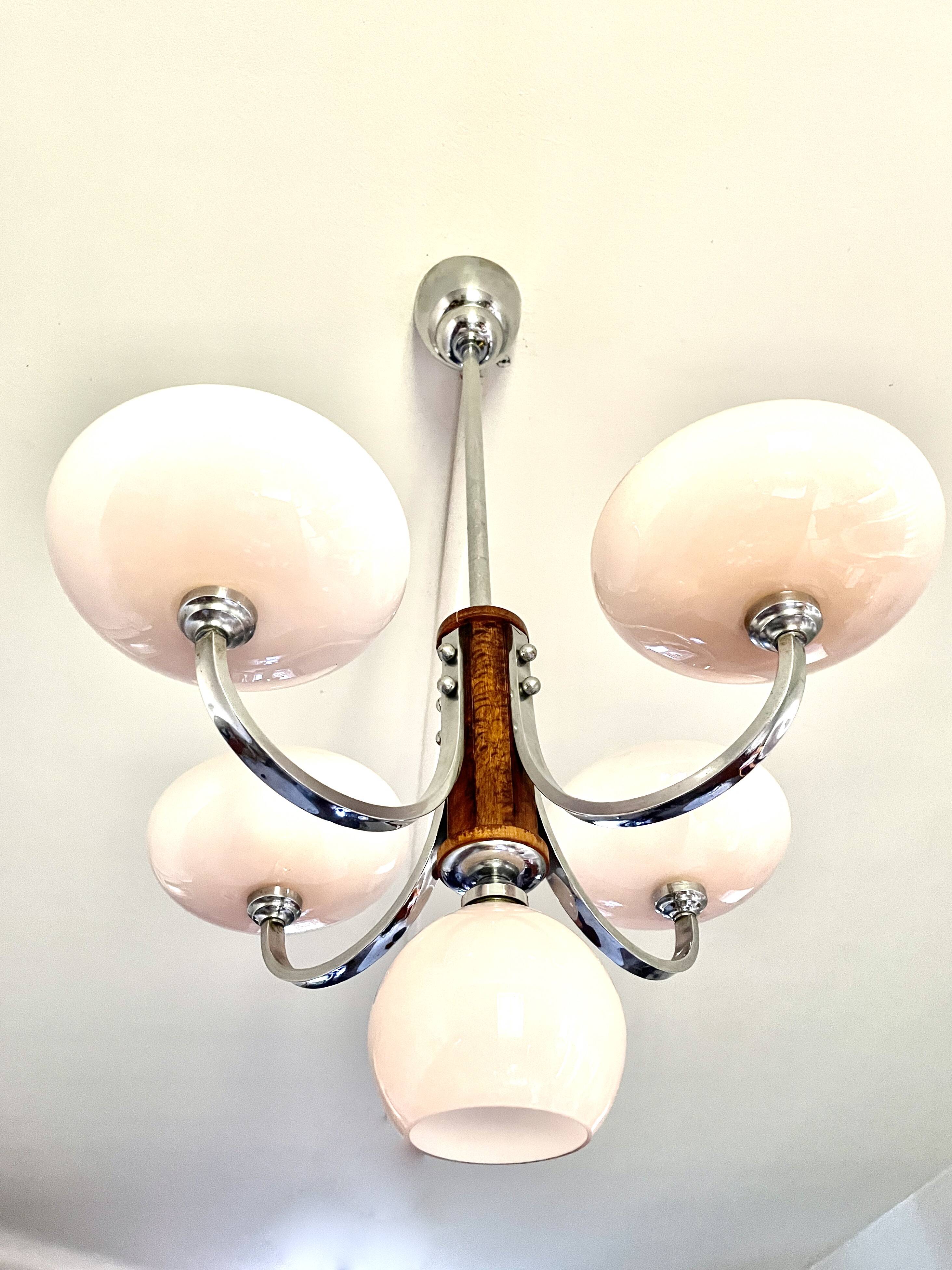Art Deco lustre with pink glass, wood, and chrome from the 1930s.