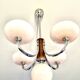 Art Deco lustre with pink glass, wood, and chrome from the 1930s.