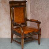 Restored antique Russian hardwood partner desk and leather armchair.