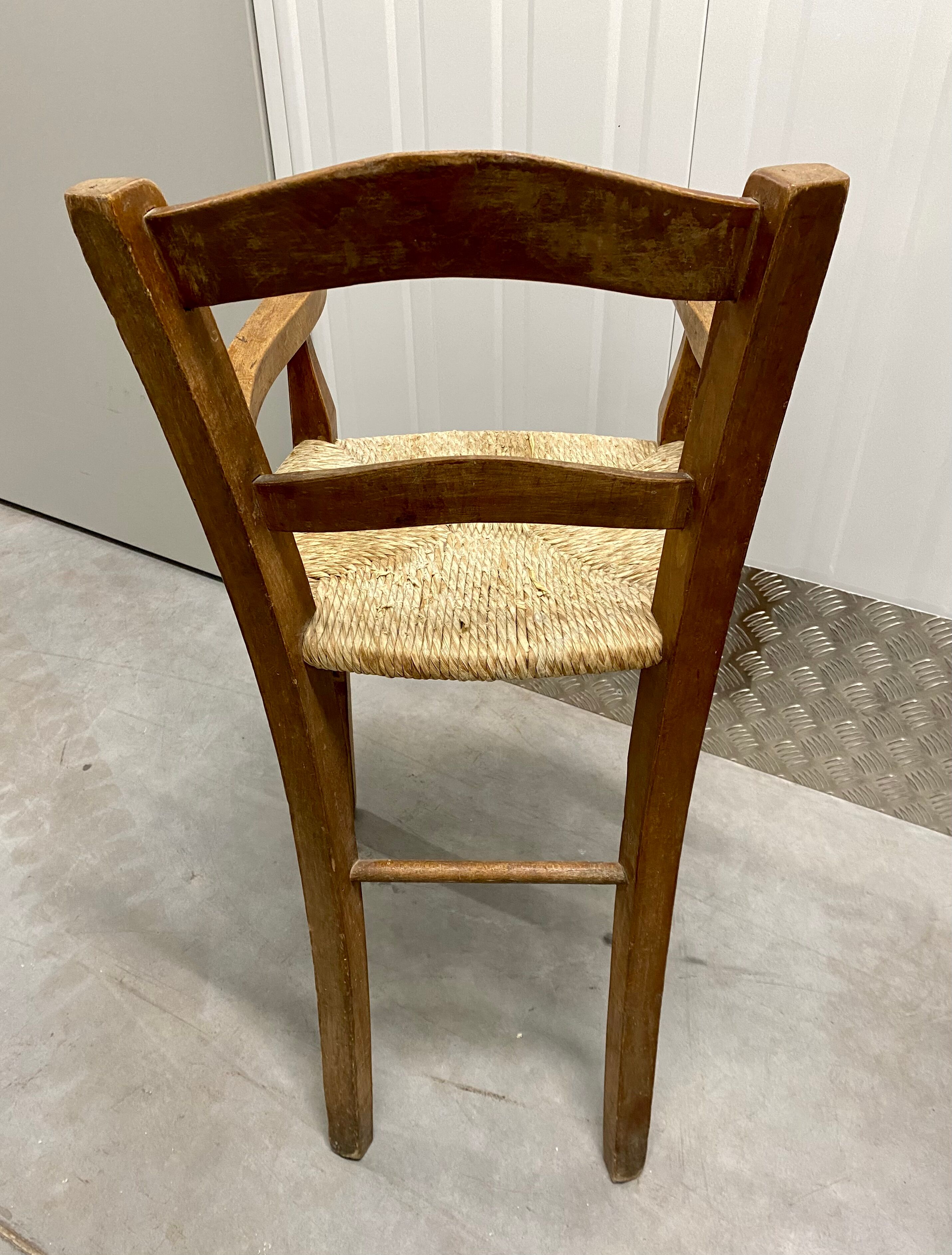 Wooden children's high chair and mulched seat