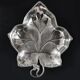 Leaf-shaped pocket tray in minimalist silver plating.