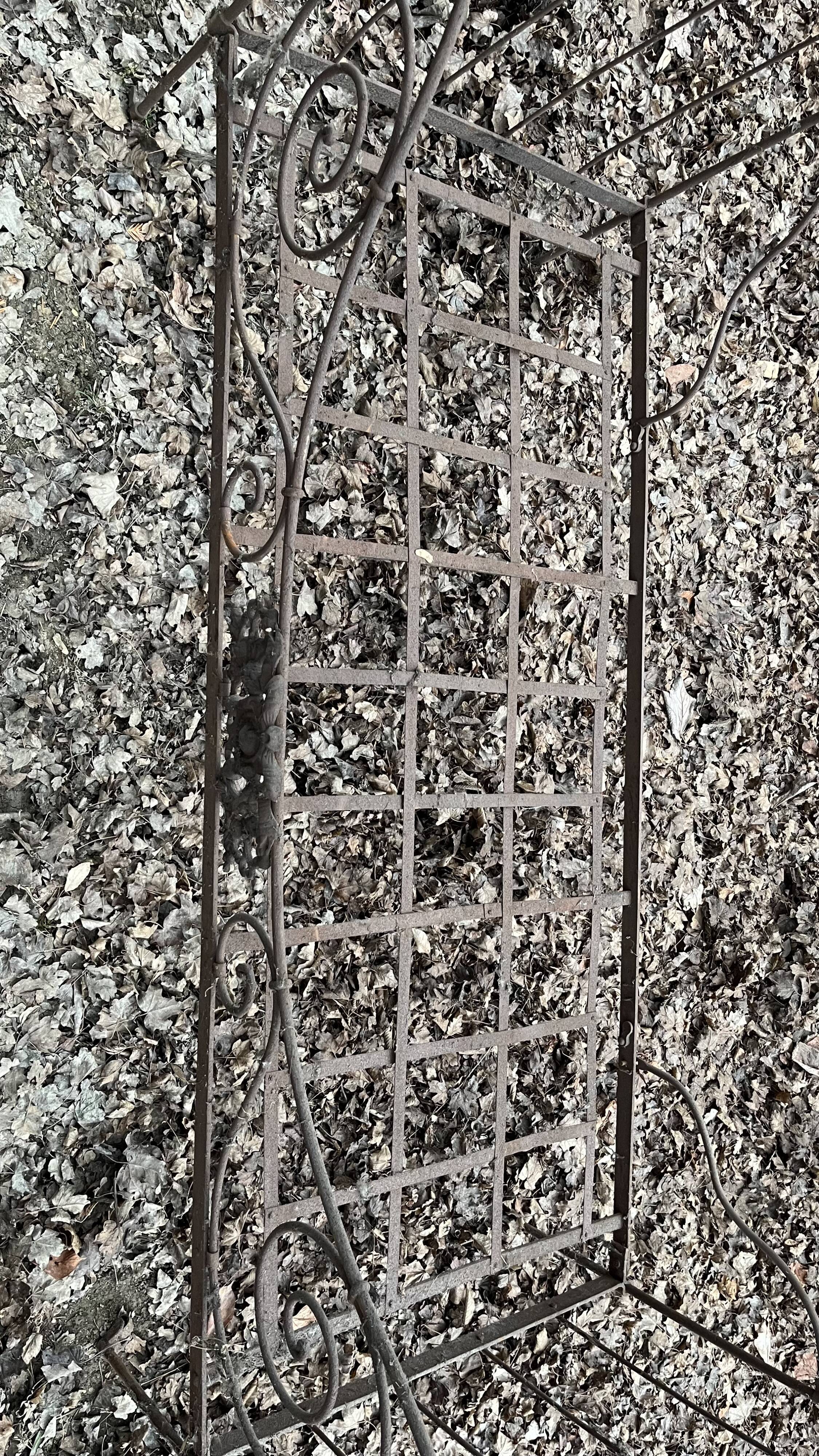 Folding wrought iron bed 1900