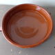 Antique dish in glazed terracotta