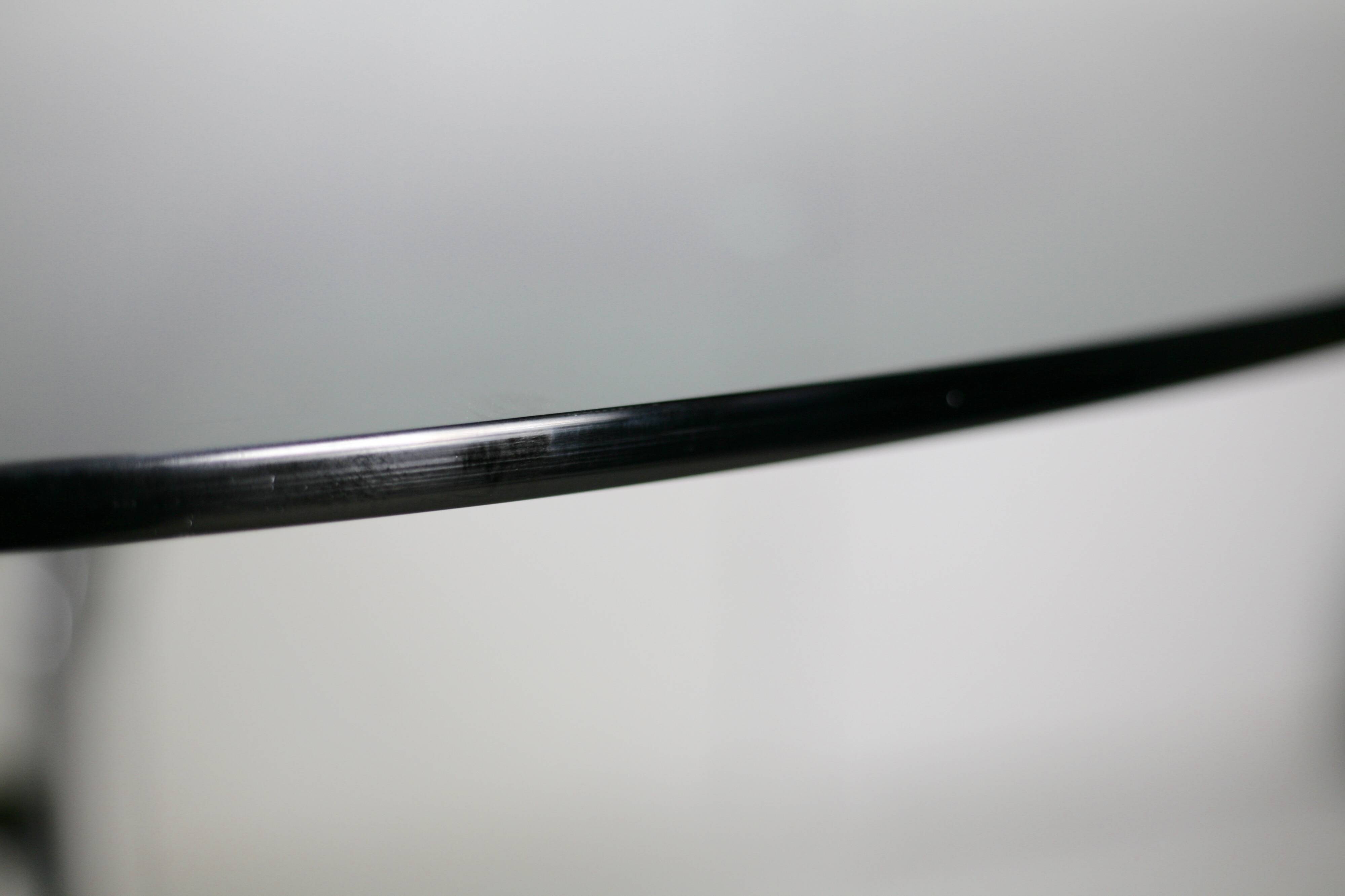 Table style Gastone Rinaldi, Italie, circa 1970. Acier chromé et dalle verre fumé.