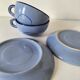 A pair of glazed ceramic cups and saucers from the 60s-70s.