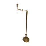 Articulated brass and gold metal floor lamp