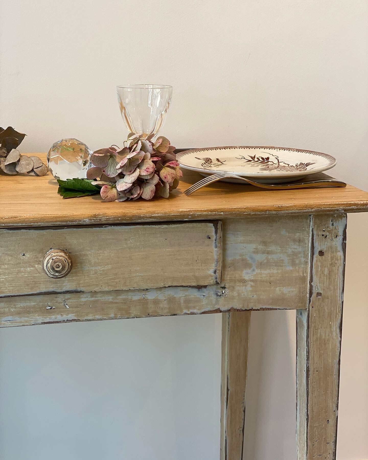 Side table in patinated wood