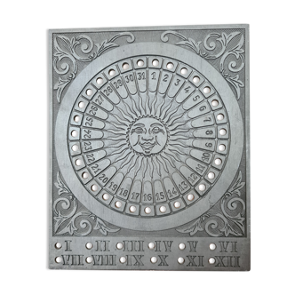 Perpetual solar calendar in tin