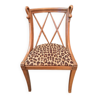 Empire style armchair with goosenecks