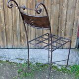 Series of 8 wrought iron garden chairs