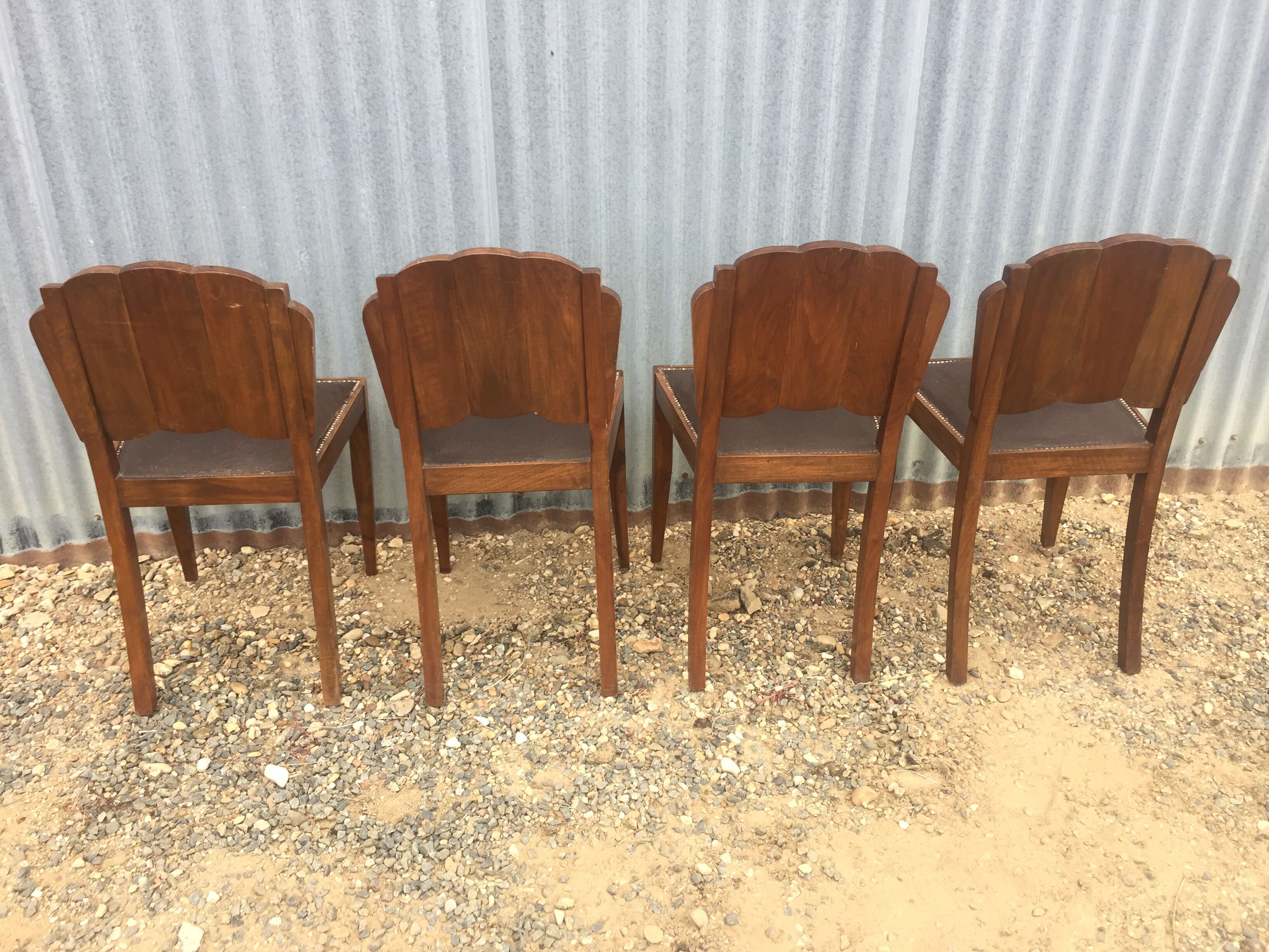 4 wooden and leather chairs art deco