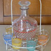 Service a Liqueur consisting of a metal servant, a carafe and 6 small vintage glasses 1950