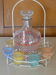 Service a Liqueur consisting of a metal servant, a carafe and 6 small vintage glasses 1950