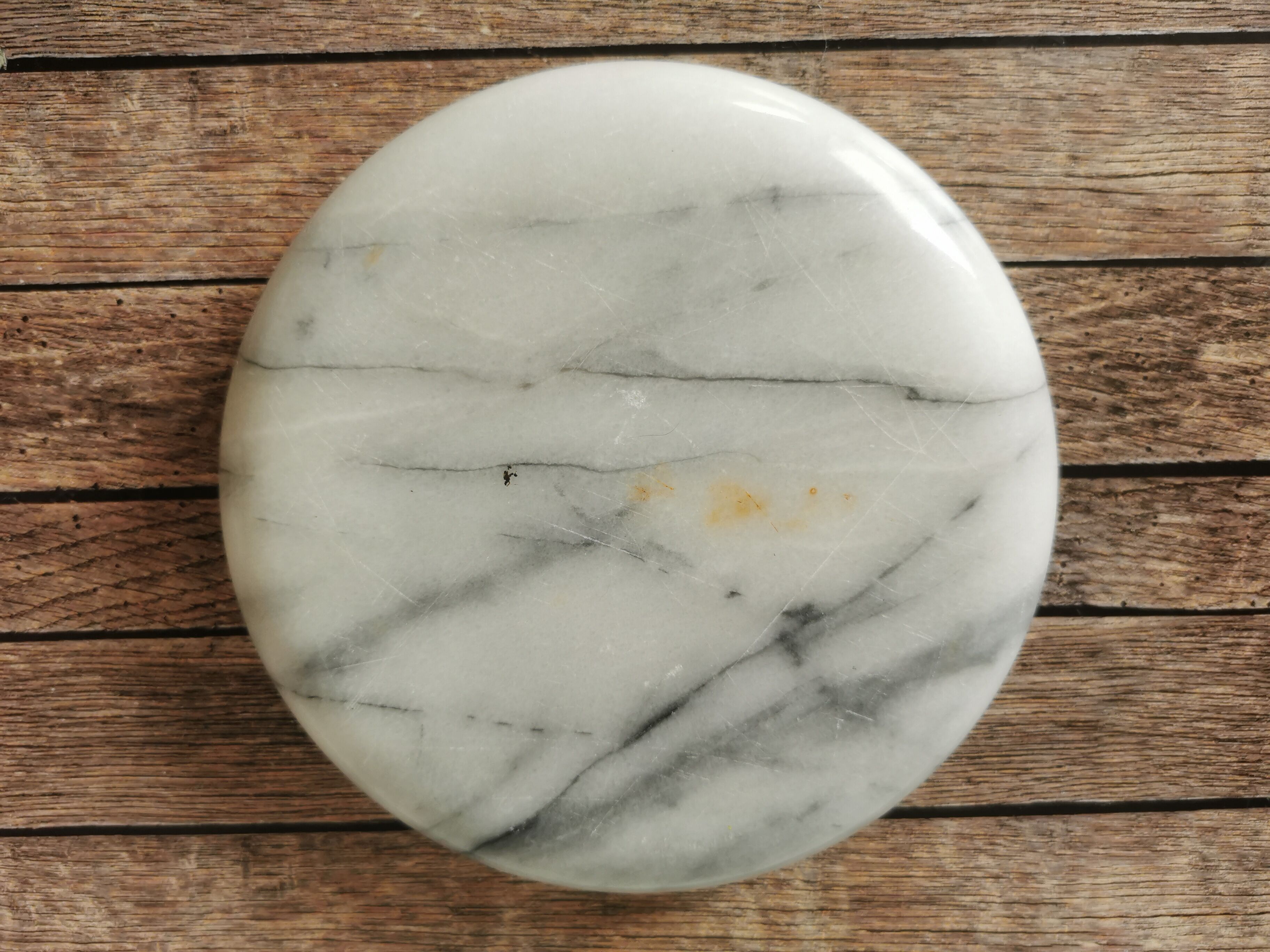 Ashtray and marble under glass