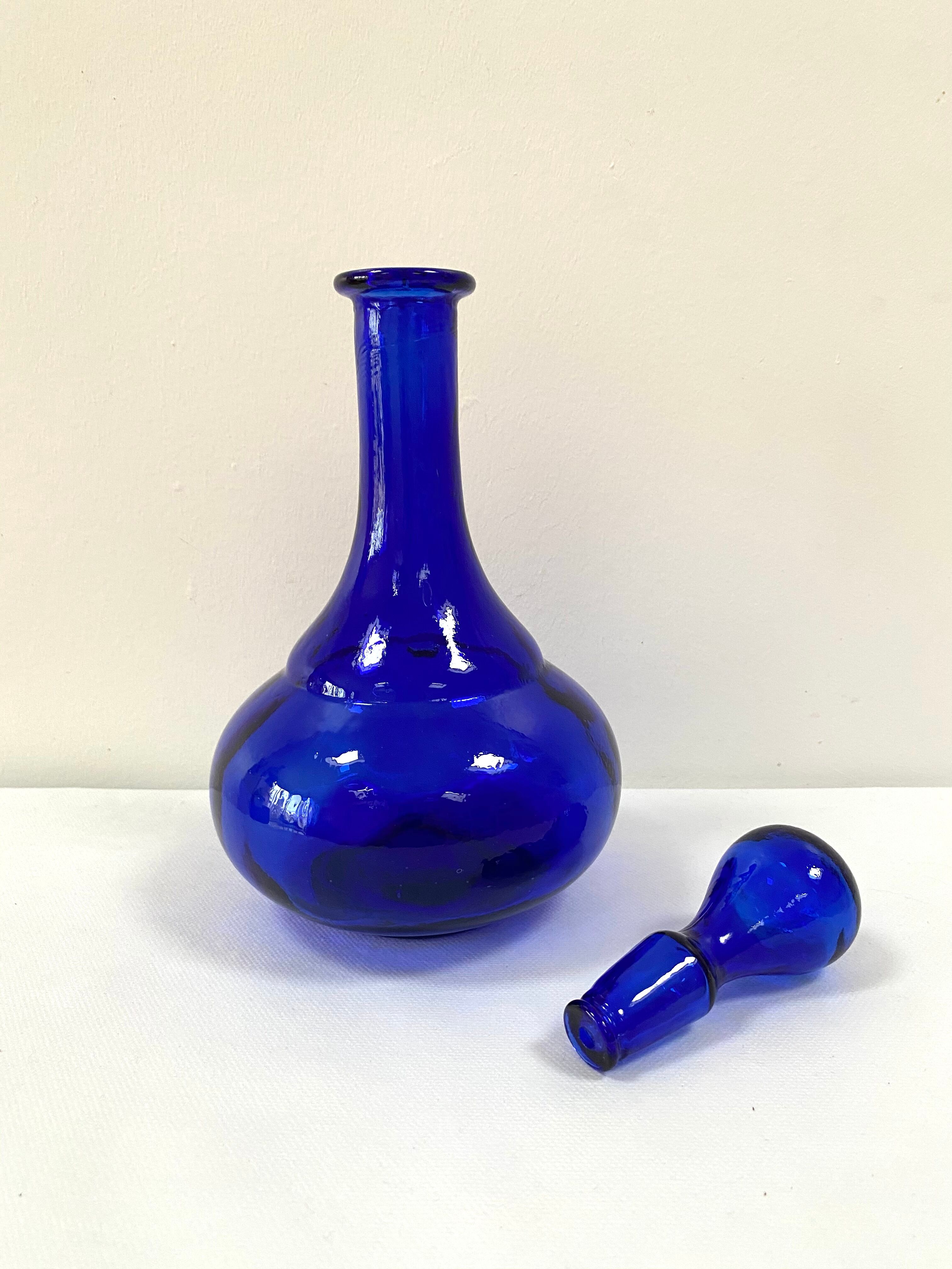 Antique decanter made of cobalt blue glass