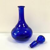 Antique decanter made of cobalt blue glass