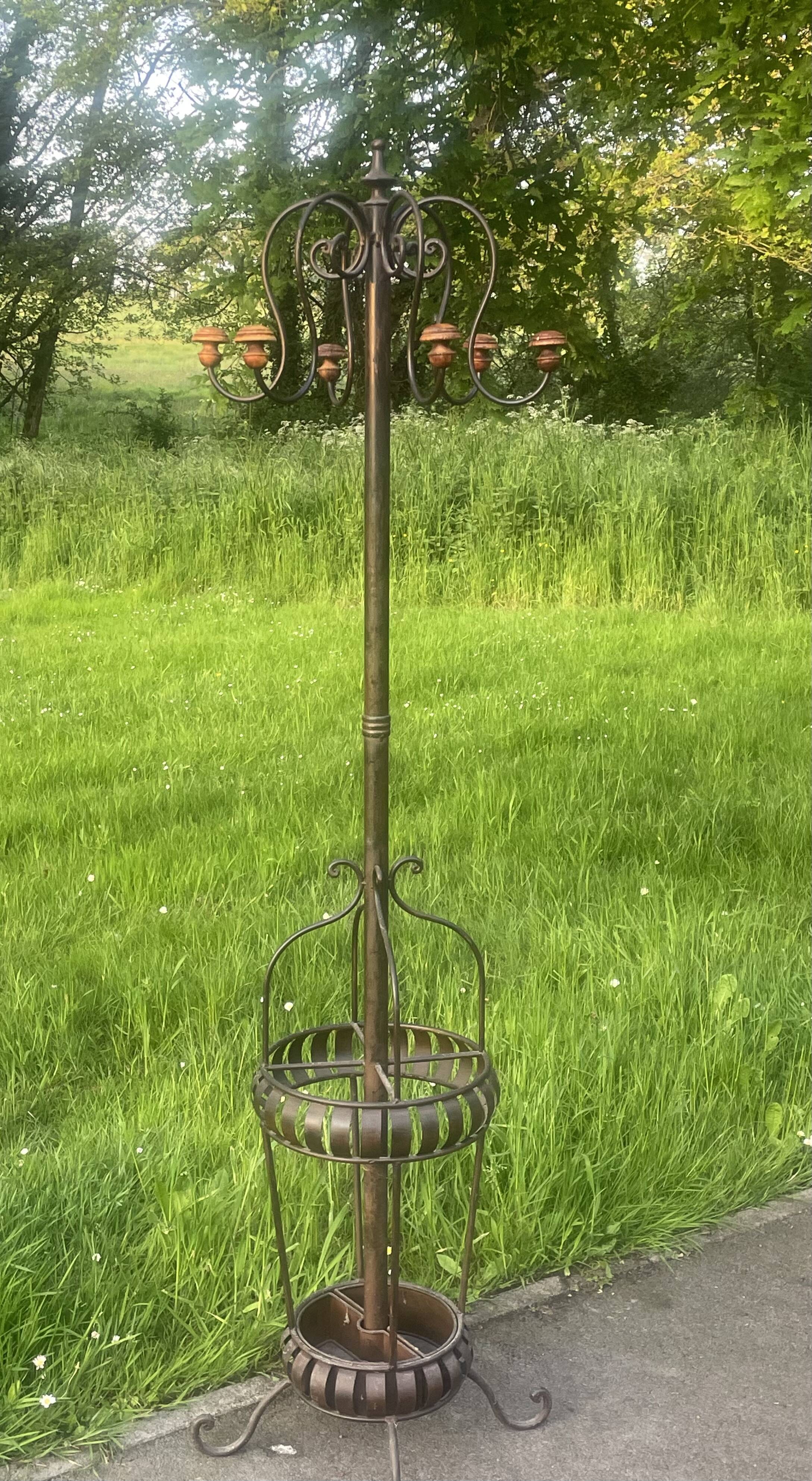 Coat rack called jellyfish, umbrella cane holder, iron and wood bistro parrot