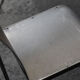 Set of 6 dining chairs in bent aluminum, 1980’s
