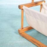 Bohemian magazine rack in vintage 70s pine style.