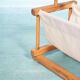 Bohemian magazine rack in vintage 70s pine style.