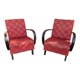 Pair of Art Deco burgundy armchairs in curved wood and fabric by Jindrich Halabala (1930s)