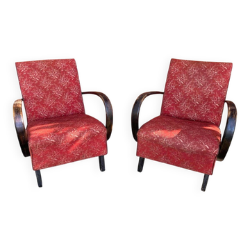 Paire de fauteuils Art Déco bordeaux en bois courbé et tissu par Jindrich Halabala (années 1930)