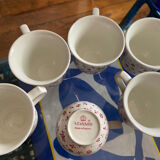 Set of 7 flowered Adams cups