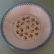 Hollow plate in earthenware, early twentieth century