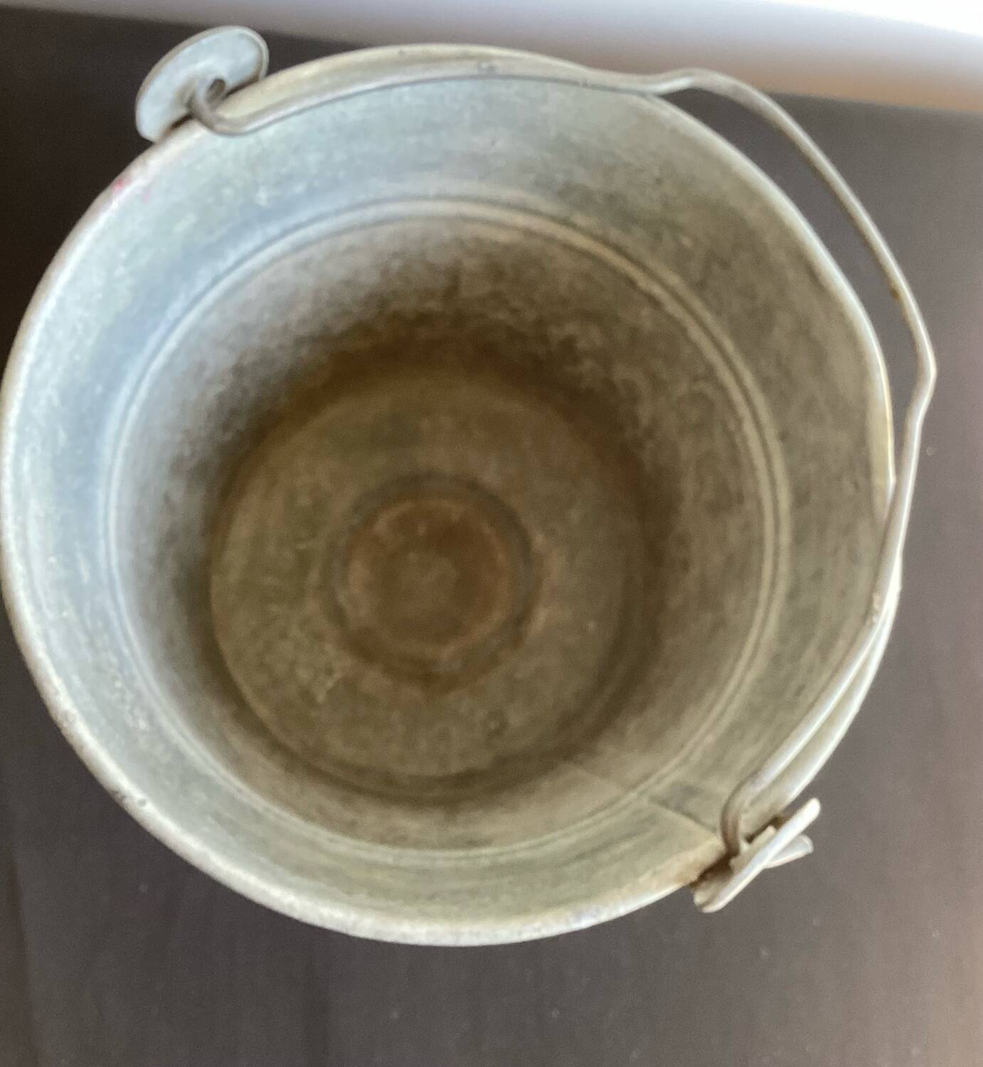 Old small galvanized steel bucket