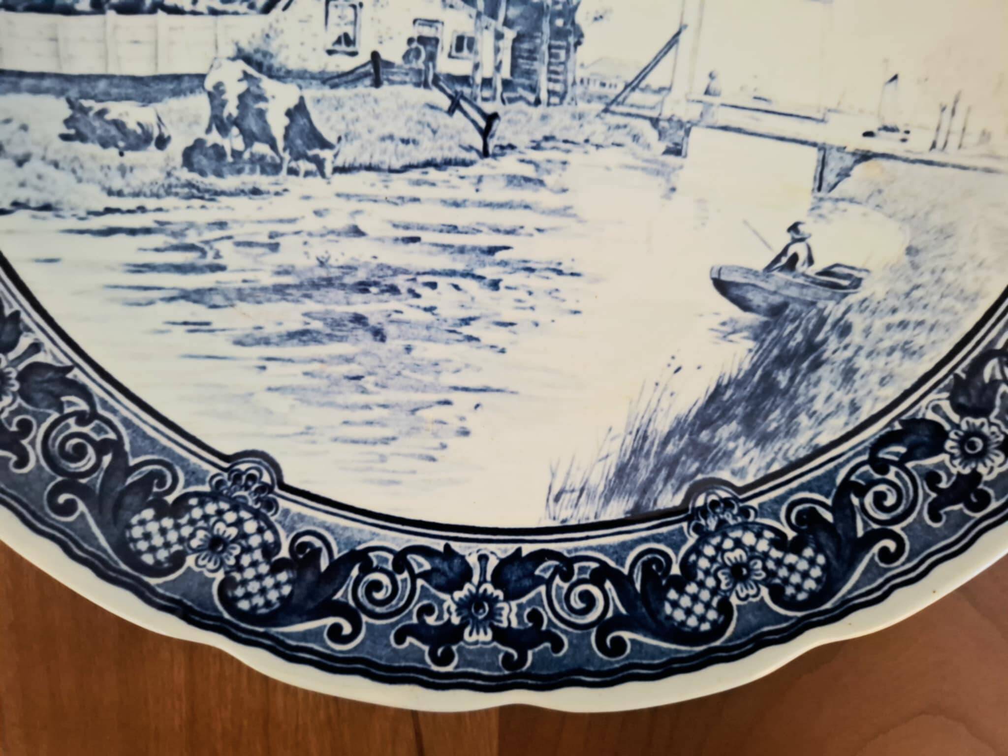 An antique Delftware dish, Royal Sphinx Maastricht, Made in Holland