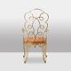 Pair of wrought iron and gilded armchairs, circa 1990