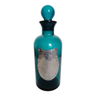 Flacon en verre et son bouchon bleu turquoise