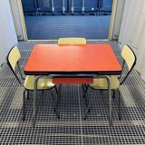Red Formica table and vintage yellow chairs