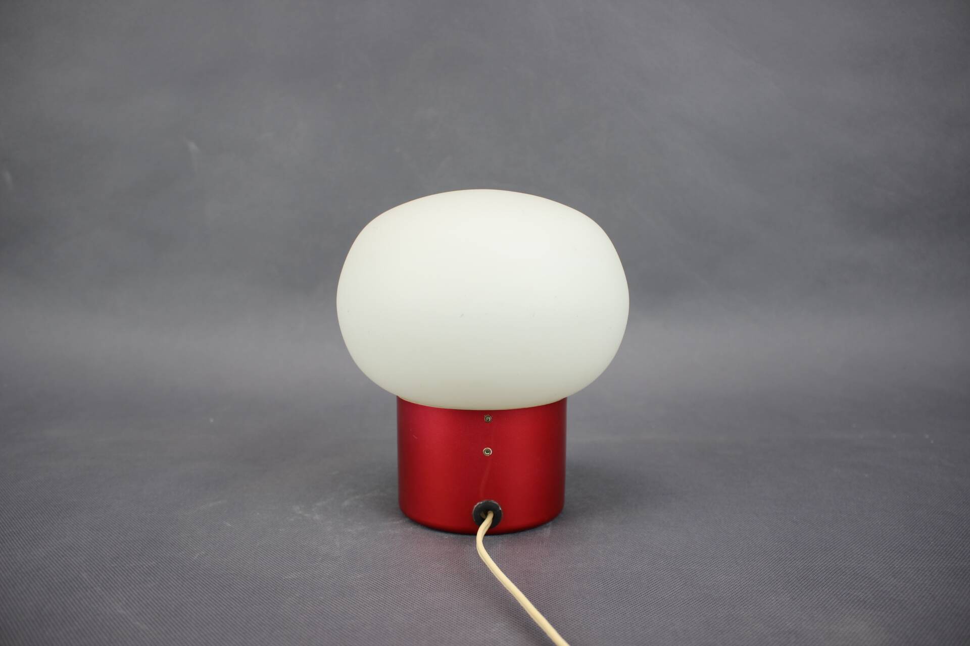Burgundy Red opaline glass table lamp from the 1970s space age.