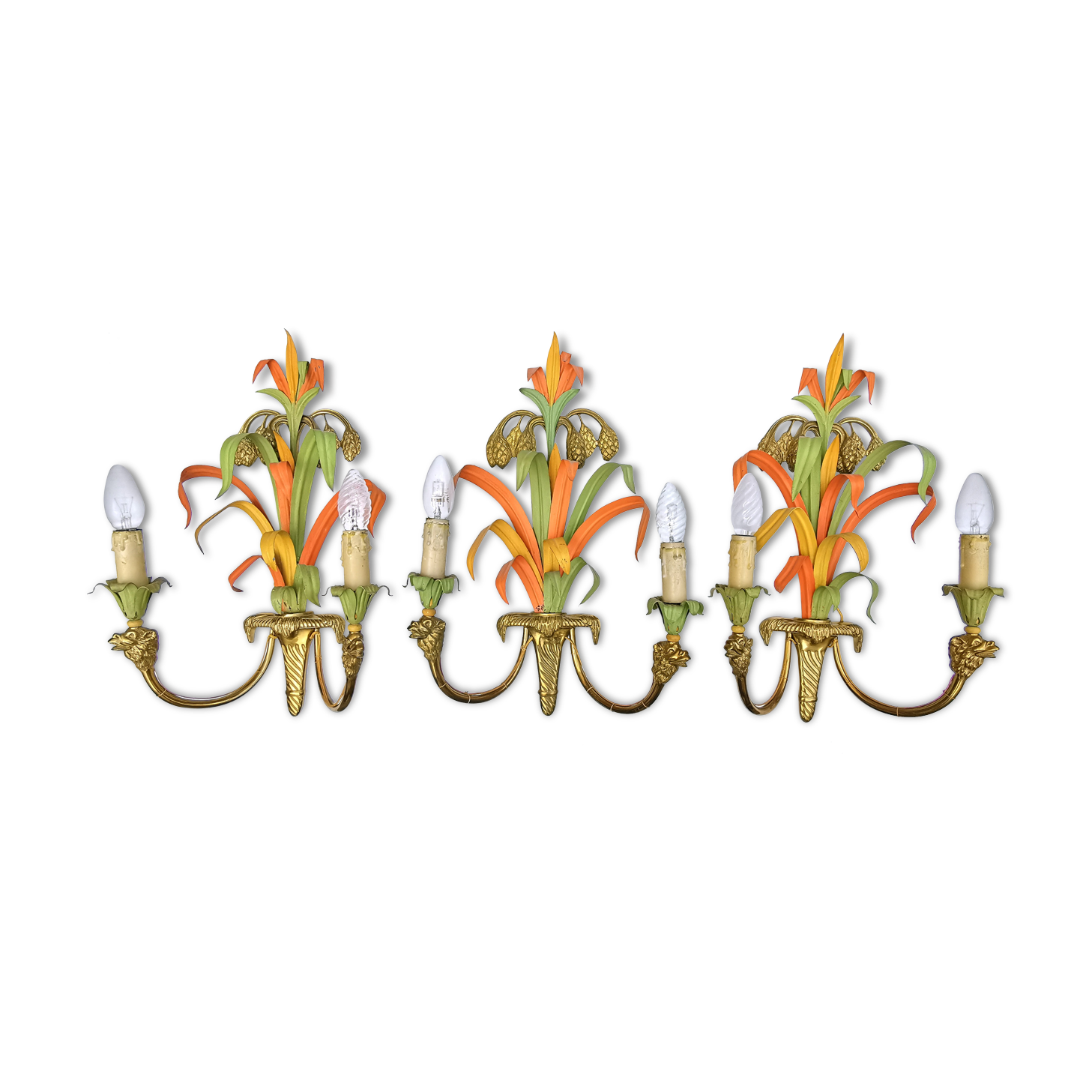 Maison Baguès, three bronze appliques decorated with camel heads and palm leaves