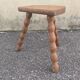 Turned wooden tripod stool